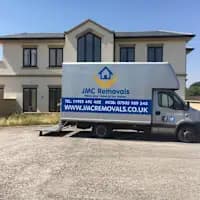 JMC Removals Luton van at residential property — storage collection Warrington